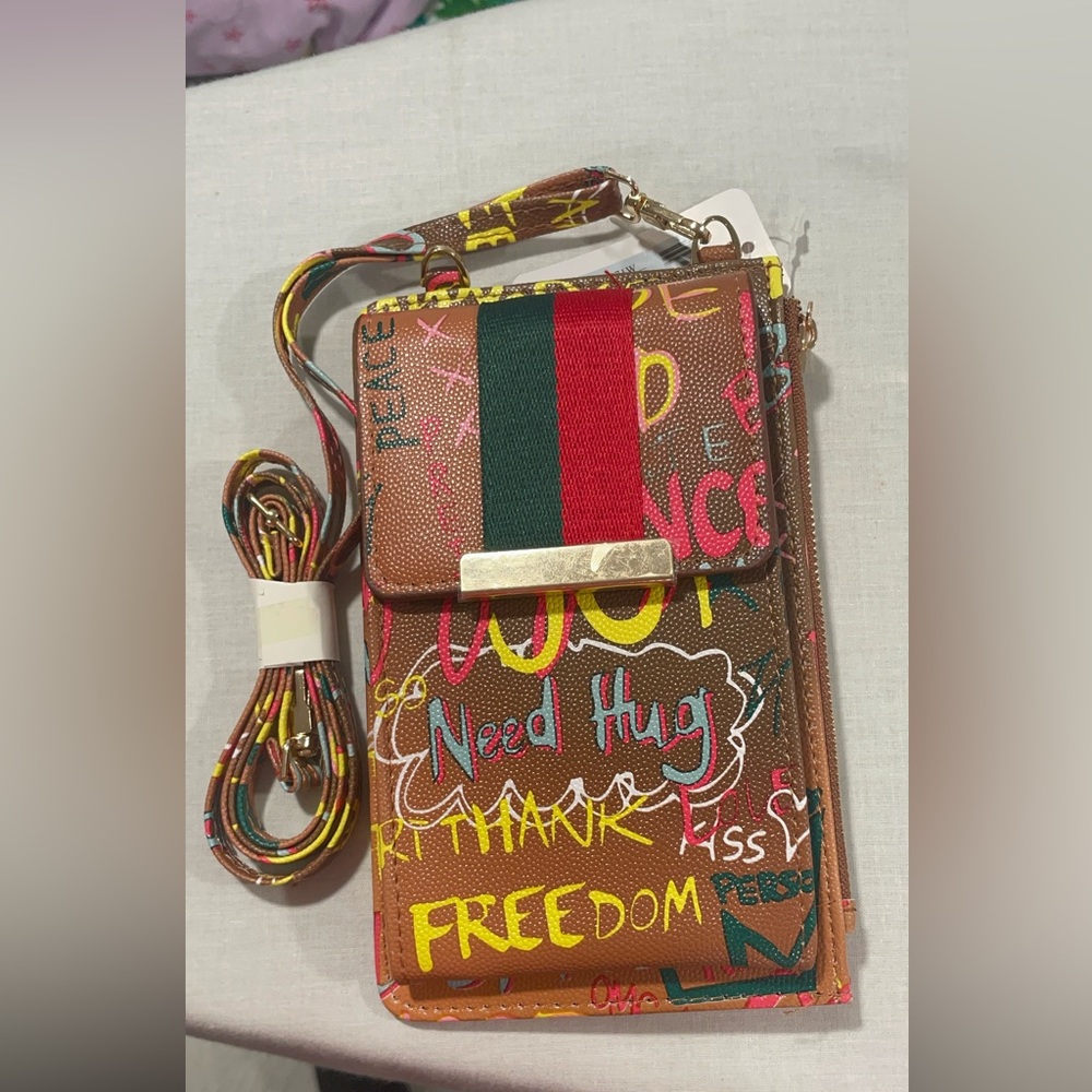 Crossbody Graffitti bag; two compartment & multiple card slots inside. $25 each